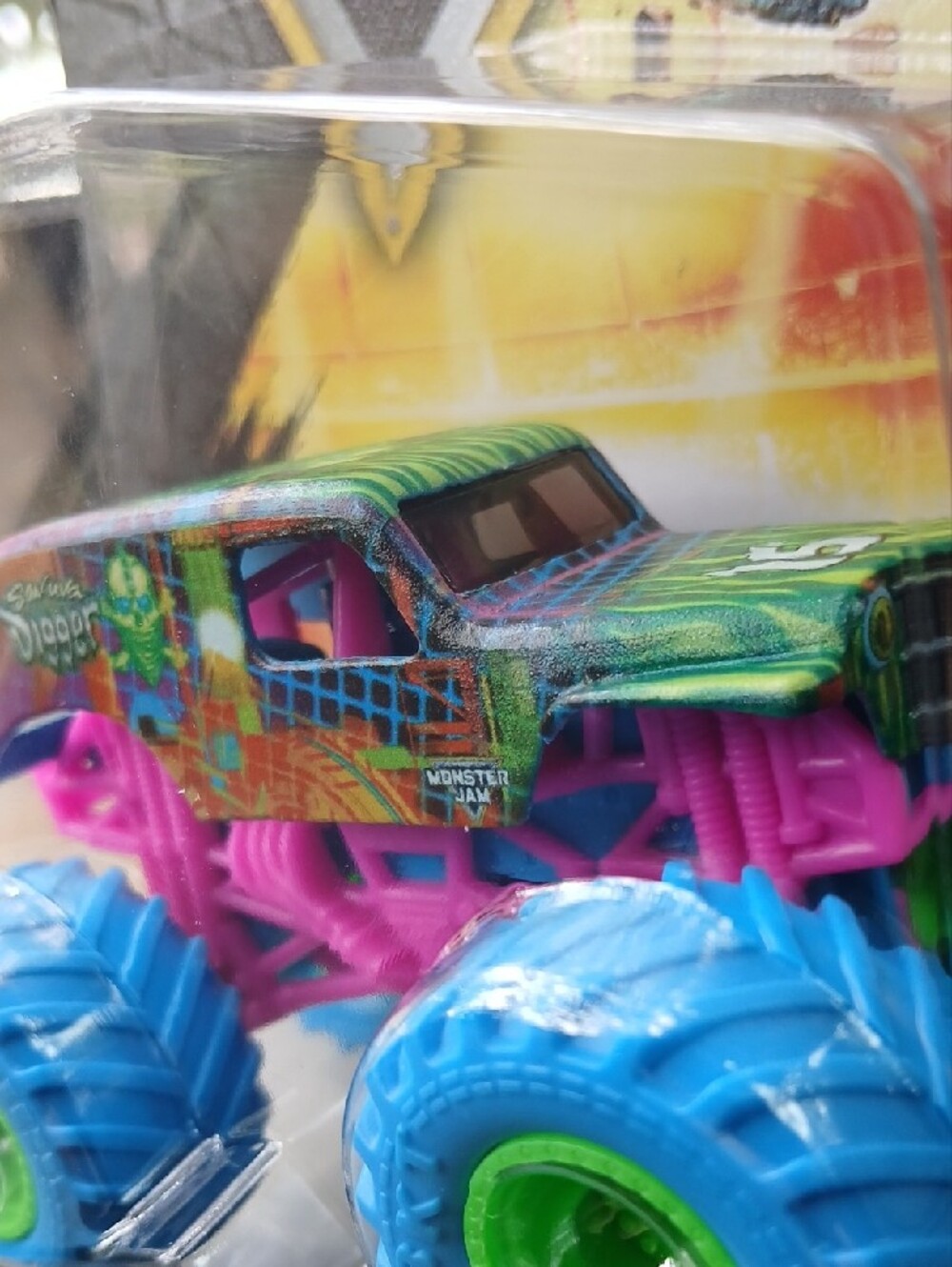 Monster Jam Son-uva Digger Truck - Pink, Blue & Green